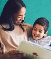 Image of a mother and child reading a book