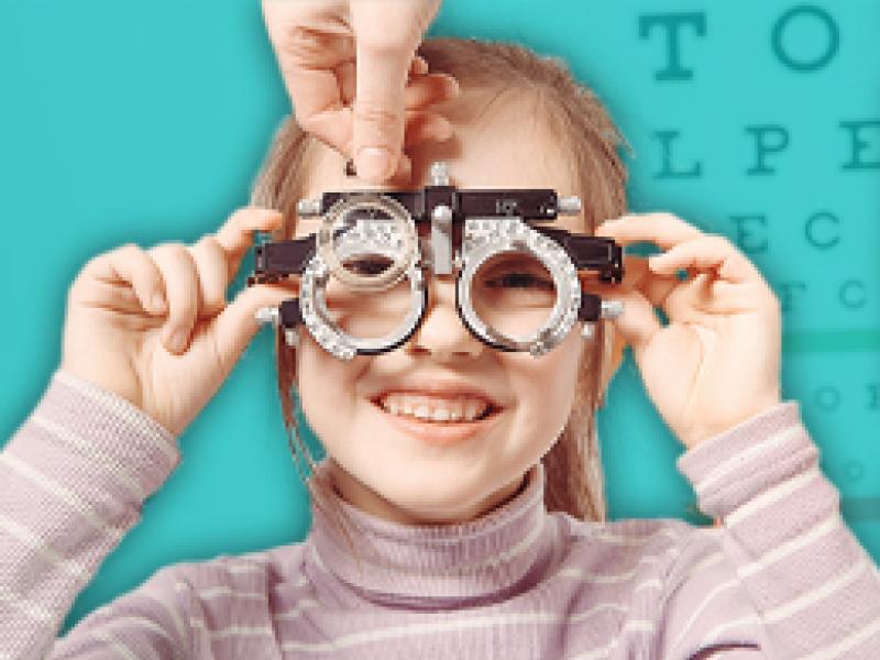 a child receiving an eye exam