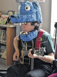photo of Kevin Sherry performing wearing a blue monster hat