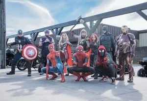 photo of people dressed up as superheroes