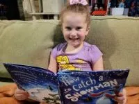 Rylee reading a book