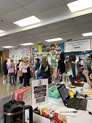 Small gathering of people waiting in line