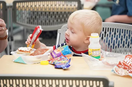 Photo of a child eating lunch